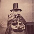 An elderly Welsh woman with apples